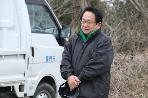 あいさつする垰村会長