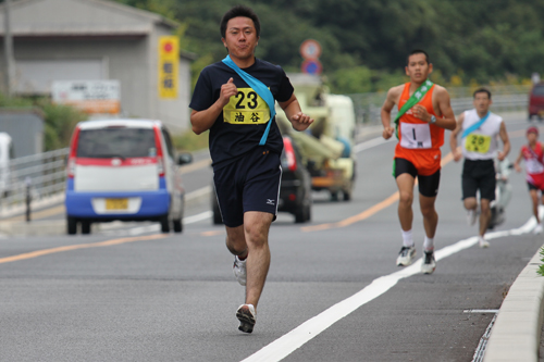 力走する選手